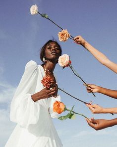 a group of people holding flowers in their hands with the caption that reads, you can't stop