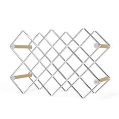 three pieces of metal and wood are arranged in a grid pattern, with two pegs on each side