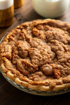 a pie sitting on top of a wooden table