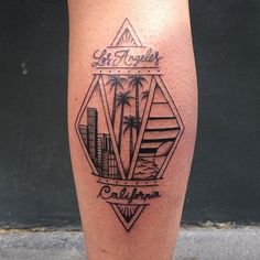 a person with a tattoo on their leg that reads get together california and palm trees