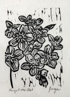 a black and white drawing of flowers on a piece of paper with the words forget me not