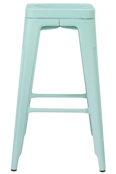 a mint green stool with two legs