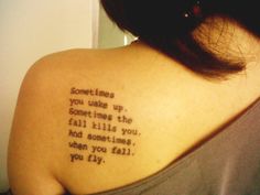 a woman with a tattoo on her back saying something you take up some things the fall kills you and sometimes when you fall