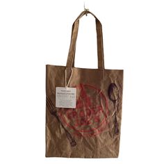 a brown bag with a fork and spoon on it