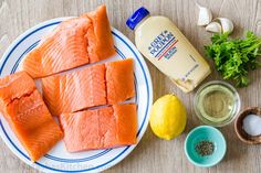 raw salmon and other ingredients on a plate