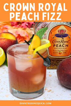 the crown royal peach fizz cocktail is garnished with lemon and lime