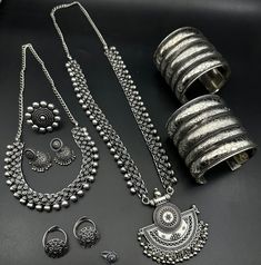 Luxury Oxidized Temple Jewelry, Luxury Oxidized Finish Temple Necklace For Festivals, Traditional Silver Sets As Gift, Traditional Silver Sets For Gifts, Silver Temple Jewelry Sets For Festivals, Navratri Themed Motif Jewelry Gift, Silver Sets For Festivals, Traditional Silver Sets For Navratri, Silver Heavy Sets For Diwali