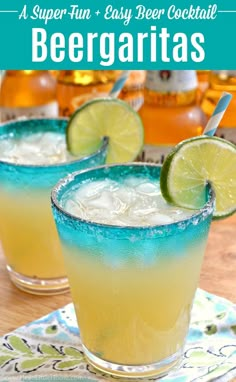 two margaritas with lime slices on the rim