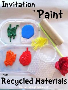 an art project for kids with recycled materials in the shape of flowers and plants, including paint