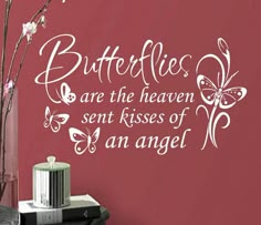 butterflies are the heaven sent kisses of an angel wall decal in white on a red background