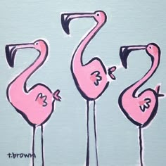 three pink flamingos standing next to each other on a blue background with the words b & w