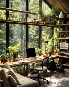 a home office with lots of plants in the window