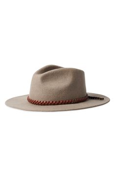 Pure wool felt elevates a Western-inspired fedora with timeless appeal. 100% wool Spot clean Imported Fall Fedora Fur Felt Hat, Fur Felt Fedora For Fall, Fall Fur Felt Fedora Hat, Brown Wool Fedora With Flat Brim, Fall Wool Beige Fedora, Fall Beige Wool Fedora, Wool Fedora With Short Brim For Fall, Fall Wool Fedora With Short Brim, Beige Wool Fedora With Curved Brim