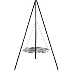 a black and white drawing of a round metal object on a tripod stand with two legs