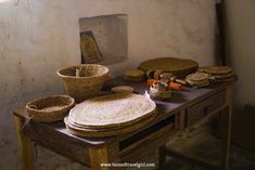 baskets and other items on a table in a room