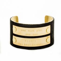 "One mom plus one son equals two best friends" engraved on two gold plates with black leather overlay on 1.5” gold cuff. Please order this product by May 3rd for Mother's Day delivery. Gold Plates, Two Best Friends, Gold Cuffs, Samsung Gear Fit