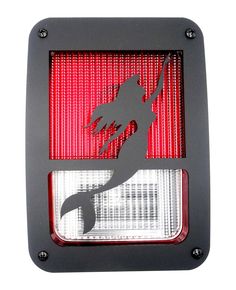 the tail light is red and has a silhouette of a horse on it's side