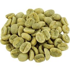 green coffee beans on a white background