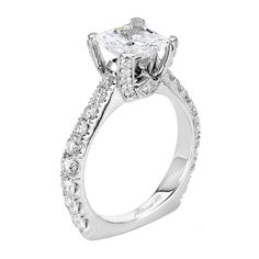 a white gold engagement ring with diamonds on it