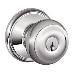 an image of a chrome door knob on a white background with clipping for text