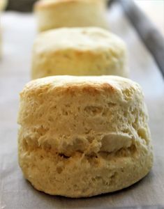 three rolls sitting on top of a piece of wax paper