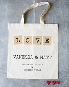 a tote bag with the words love spelled on it