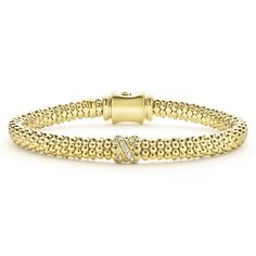 An 18K gold diamond X station wraps this Caviar beaded bracelet. LAGOS diamonds are the highest quality natural stones. Luxury Gold-plated Gemstone Bracelet, Lagos Rings, Lagos Caviar Necklace On, Lagos Caviar Bracelet, Luxury Gold-tone Bracelets With Rectangular Links, Script Monogram, Engraved Items, Arm Candy, Bracelet Sizes