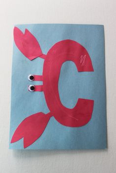 the letter c is made out of construction paper