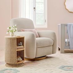 a baby's room with a rocking chair and crib