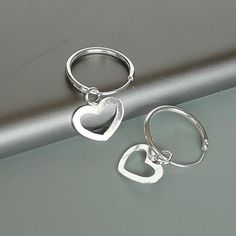 Hey, I found this really awesome Etsy listing at https://www.etsy.com/listing/775345784/heart-charm-hoop-sterling-silver-14-mm Silver Huggie Earrings For Valentine's Day, Silver Huggie Earrings With Heart Charm For Gift, Small Hoop Sterling Silver Heart Earrings Hypoallergenic, Small Hoop Earrings For Valentine's Day, Silver Sterling Heart Charm Huggie Earrings, Hypoallergenic Small Hoop Heart Earrings In Sterling Silver, Silver Sterling Silver Huggie Earrings For Valentine's Day, Minimalist Silver Hoop Earrings For Valentine's Day, Sterling Silver Hoop Jewelry For Valentine's Day