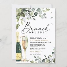 the brunch and bubbly wedding card is shown on a white background with greenery