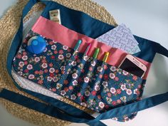 the purse has many items in it and is ready to be used as a bag