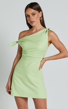 Get ready to turn heads in the Jeofina Mini Dress! This one-shoulder tie dress in a gorgeous celery shade is perfect for any party day or night. Made from a blend of cotton and rayon, this A-line dress is not only stylish but also comfortable to wear. The one-shoulder design adds a touch of sophistication, while the mini length shows off your legs. Whether you're hitting the club or attending a summer soirée, this dress will make you feel confident and empowered. Stand out from the crowd and sho Pref Day Outfit Sorority Recruitment, Pref Dresses, Green Dress Summer, Recruitment Dresses, Formal Fits, A Line Mini Dress, Emerald Green Dress, Off The Shoulder Mini Dress, Cute Homecoming Dresses