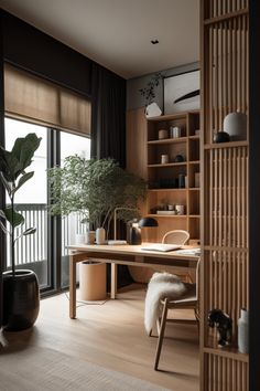 a room with a table, chair and plant in it next to a large window