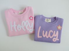 We love this classic hand-embroidered sweatshirt for toddlers and children! Each name or phrase is cut from felt and hand stitched with matching thread. This sweatshirt is cozy and perfect to wear nearly all year long! **Matching mama sweatshirts available here: https://www.etsy.com/listing/1398883765/hand-embroidered-mama-sweatshirt-custom ** Additional baby & toddler sizes/colors available here: https://www.etsy.com/shop/thebloomingbike ---- DETAILS: - This listing is for one custom embroidered sweatshirt. Each item is made-to-order. If you are ordering more than one item, please make sure to add each to your cart. - This design includes up to 10 characters.  - Felt is hand stitched with matching thread unless otherwise requested. - Add-on flowers, hearts, and other designs are available Hand Embroidered Sweatshirt, Sweatshirt Diy, Name Sweatshirt, Sibling Shirts, Diy Sweatshirt, Toddler Sweater, Hand Embroidery Projects, Mama Sweatshirt