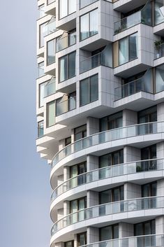 a tall building with balconies and windows