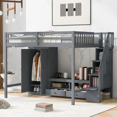 a loft bed with stairs and storage underneath it in a room that has white walls