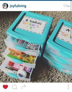 two blue plastic containers filled with school supplies