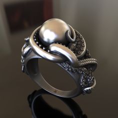 Dive into the enchanting depths of the ocean with our handcrafted Octopus 925 Silver Ring. This exceptional, unisex piece captures the beauty and mystique of one of the sea's most intelligent creatures. Inspired by the intricate movements and fluidity of the octopus, our artisans have masterfully crafted a one-of-a-kind design that intertwines tentacles to form an adjustable band. Made from high-quality 925 silver, this ring boasts durability and a stunning, lasting shine. The Octopus Silver Rin Octopus Ring, Masonic Ring, Viking Ring, Retro Ring, Animal Rings, Cross Ring, Everyday Rings, Handmade Rings, Gifts For Brother