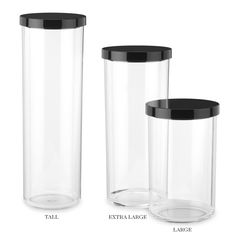 three clear vases with black lids are shown in different sizes and shapes, along with each other