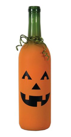 an orange bottle with a jack - o'- lantern face on it