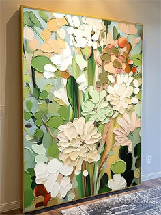 a painting on the wall with flowers in it