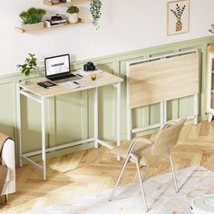 a living room filled with furniture and a laptop computer on top of a wooden desk