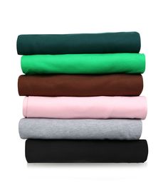 four sheets stacked on top of each other in different colors and sizes, all folded together