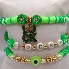 New Listing - St. Patrick's  Day inspired set of (3) bracelets.   They are adult sized large, made with clay heishi beads, Clover Charms with green, white and gold tones...no clasp bracelets.  Friendship bracelets, set of 3 included! These make great custom gifts! Thank you for supporting a veteran owned, small business! ☘️☘️☘️ Green Heishi Beads Friendship Bracelet, Green And White Clay Bead Bracelet, Green Bracelet Clay Bead, St Patricks Day Bracelets, St Patrick’s Day Clay Bead Bracelet, Clover Charm, Heishi Beads, Saint Patrick, Bracelet Clasps