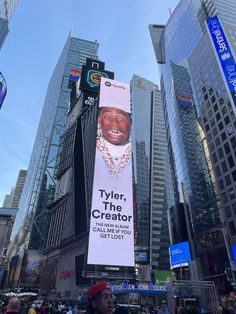 a billboard advertises tyler the creator in new york city's times square