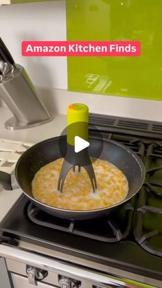 a frying pan on top of an oven with food cooking in it and the words amazon kitchen finds