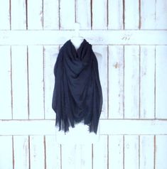 "Handmade large black gauzy crinkled cotton blend wrap shawl scarf/oversized lightweight black scarf/unisex raw hem fringe scarf Measurements... -length: 76\" -width: 56\" Features... -lightweight gauzy cotton/poly blend -raw fringe edges -oversized design perfect for use as a shawl, scarf or cover up -the perfect layering piece -handmade in California -made to order" Black Bohemian Scarf For Fall, Black Shawl Wrap For Fall, Black Shawl For Fall, Black Cotton Scarf For Winter, Black Shawl Scarf For Summer, Black Cotton Scarves For Winter, Black Scarf For Fall, Black Cotton Winter Scarf, Black Summer Shawl Scarf