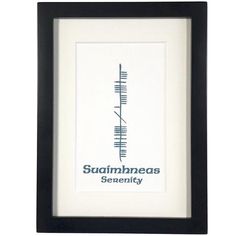 a black frame holds a blue and white print with the words savannah seventy on it