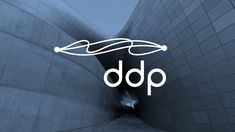 the logo for ddp is shown in front of a building with stairs and a curved door